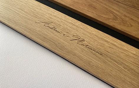 Oak wood album with printed names or logos of the spouses
